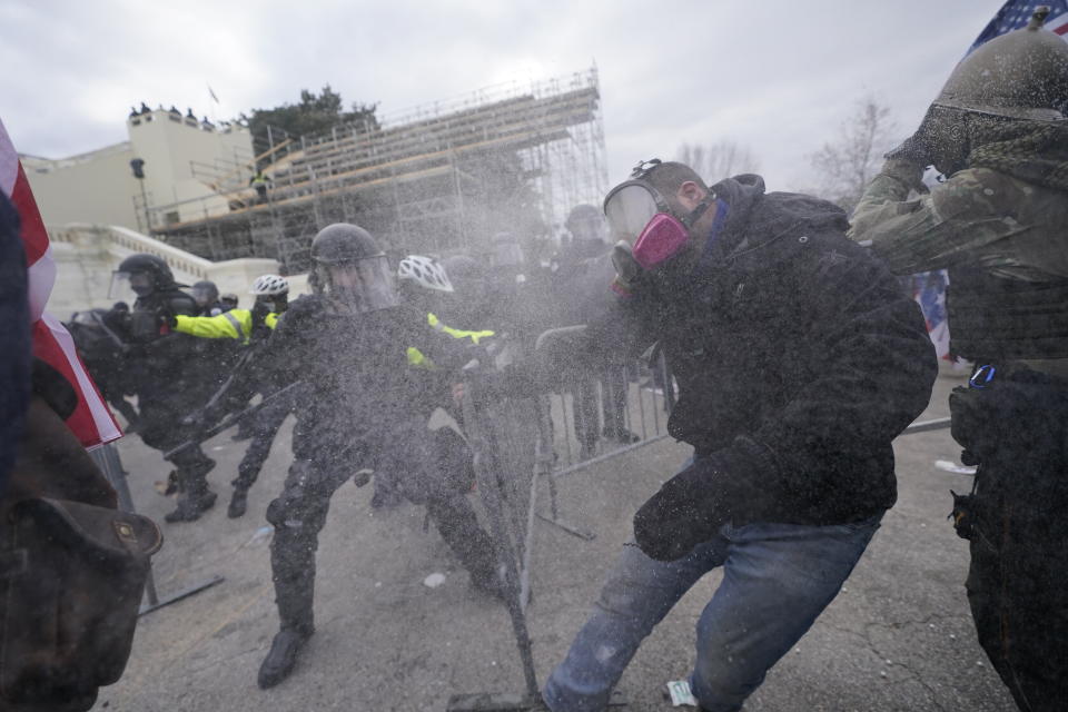 Trump supporters try to break through a police barrier, Wednesday, Jan. 6, at the Capitol in Washington, D.C. (Photo: Julio Cortez/ASSOCIATED PRESS)