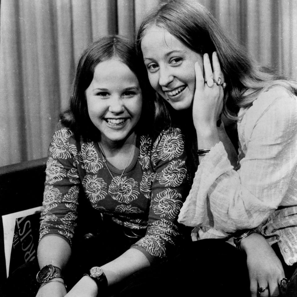 Linda Blair, aged 15, with her sister Debbi during a 1974 press tour for The Exorcist - Getty