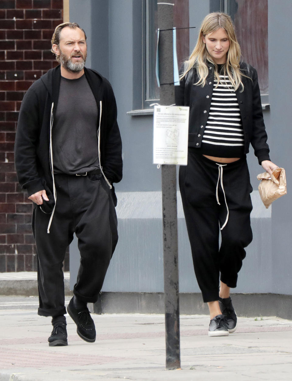 <p>Jude Law and Phillipa Coan take a spin around Camden Town in London on Tuesday, after making a visit to the Salvation Army.</p>