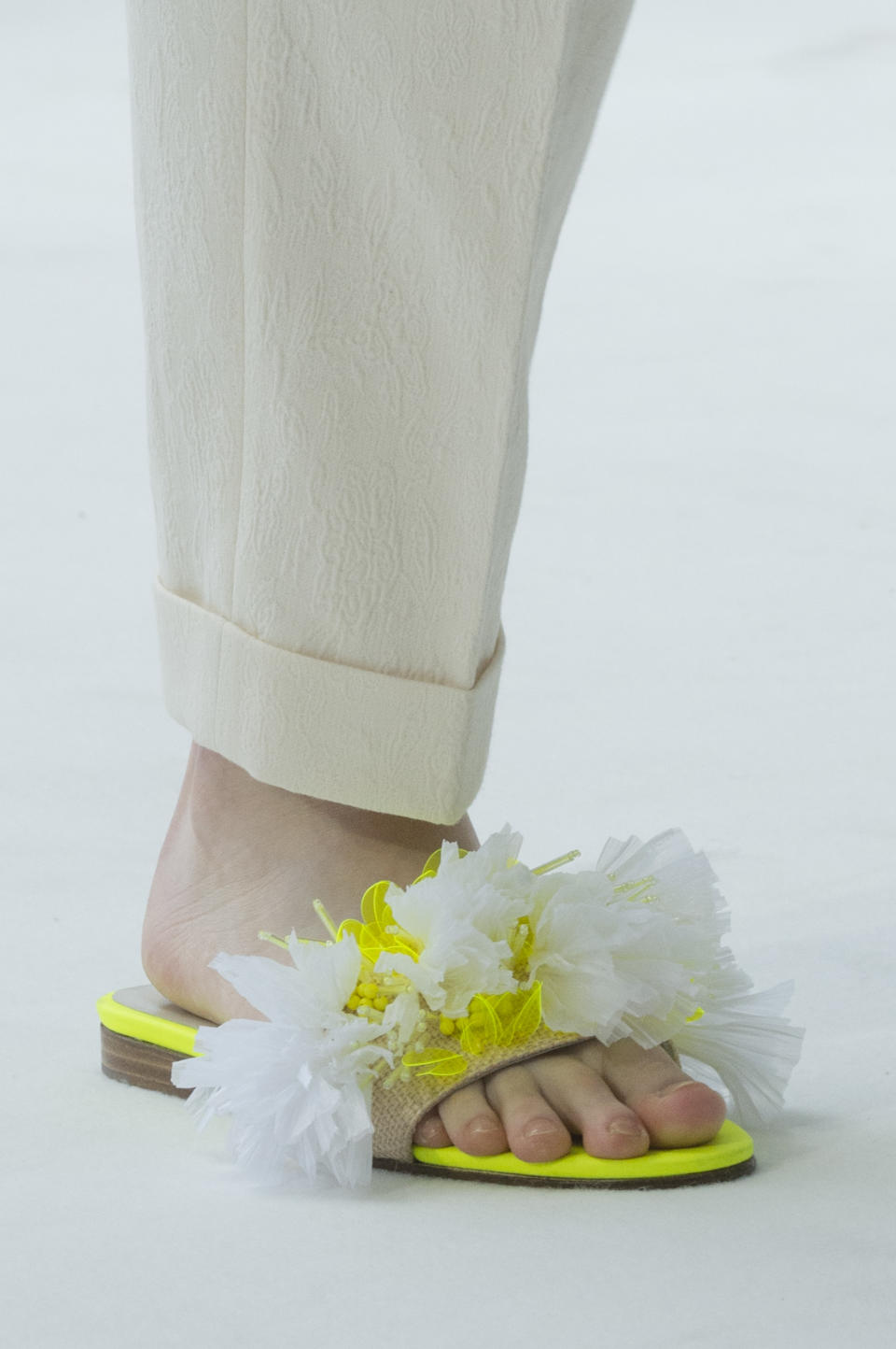<p><i>Green and white frilly slides from the SS18 Delpozo collection. (Photo: ImaxTree) </i></p>