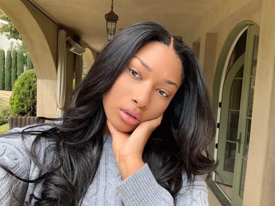 Megan Thee Stallion snaps a selfie with a bare-faced look on April 7, 2020, captioning it, "Quarantine megs."