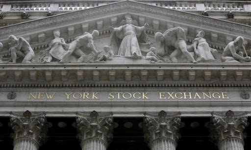 FILE - This Thursday, Oct. 2, 2014, file photo, shows the facade of the New York Stock Exchange. Global stock markets mostly rose on Tuesday, Aug. 30, 2016, as investors weighed the possibility and timing of another U.S. interest rate increase this year. (AP Photo/Richard Drew, File)