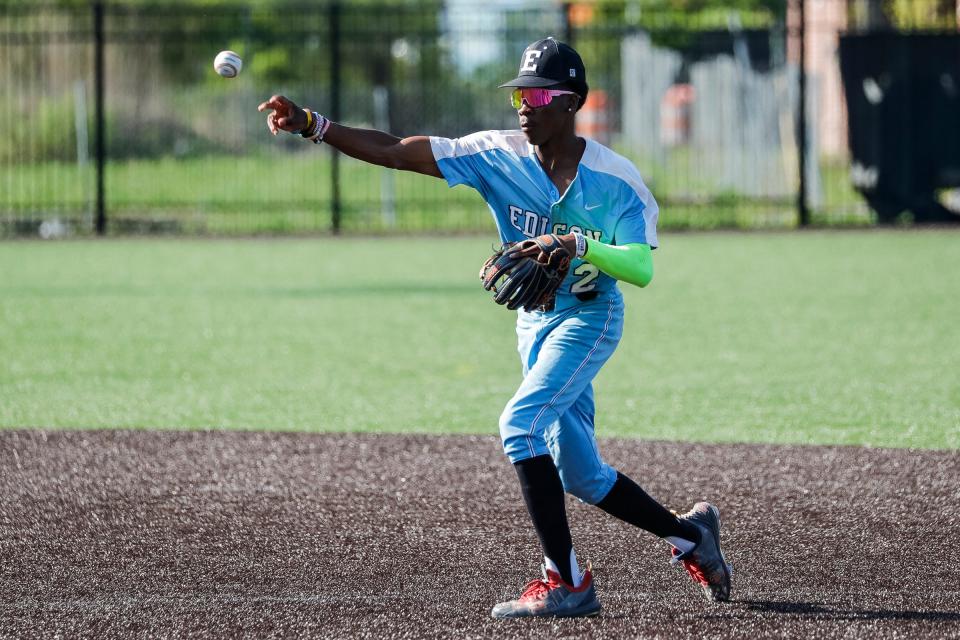 Detroit Edison second baseman Marwynn Matthews (2) throws toward home against Orchard Lake St. Mary's during the fourth inning at The Corner Ballpark at Michigan and Trumbull in Detroit on Friday, May 13, 2022.