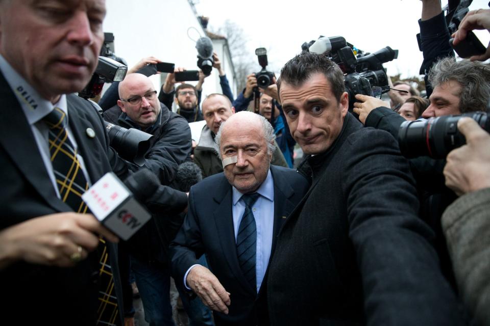 FIFA president Joseph S. Blatter arrives for a press conference as reaction to his banishment for eight years by the FIFA ethics committee at FIFA's former headquarters at Sonnenberg in Zurich
