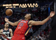 New Orleans Pelicans guard Trey Murphy III (25) reacts after scoring against the Portland Trail Blazers during the second half of an NBA basketball game in Portland, Ore., Tuesday, April 9, 2024. (AP Photo/Craig Mitchelldyer)