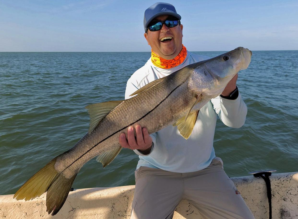 Mike Spain of Orlando caught this 35-inch snook, his personal best, on a live shrimp while fishing in Crystal River with Capt. Marrio Castello, of Tall Tales Charters on Monday.