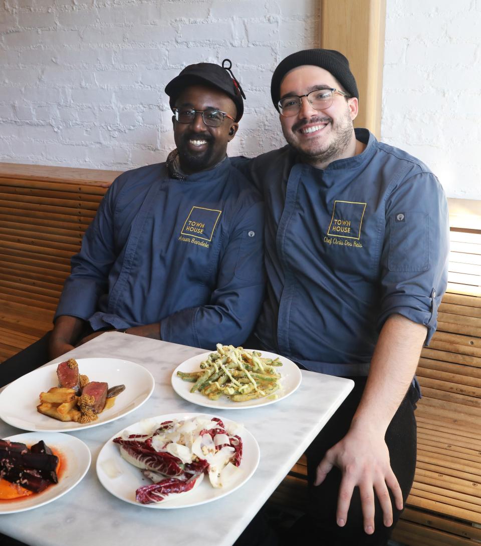 Sous chef Anum Bandel, left, and executive chef Christopher dos Reis with some of their dishes at Town House restaurant in New Rochelle Jan. 7, 2022. The multi-level space serves contemporary American brasserie fare.