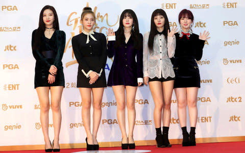 South Korean popular girl band Red Velvet poses for photographers during the 32nd Golden Disc Awards in Goyang - Credit: AP