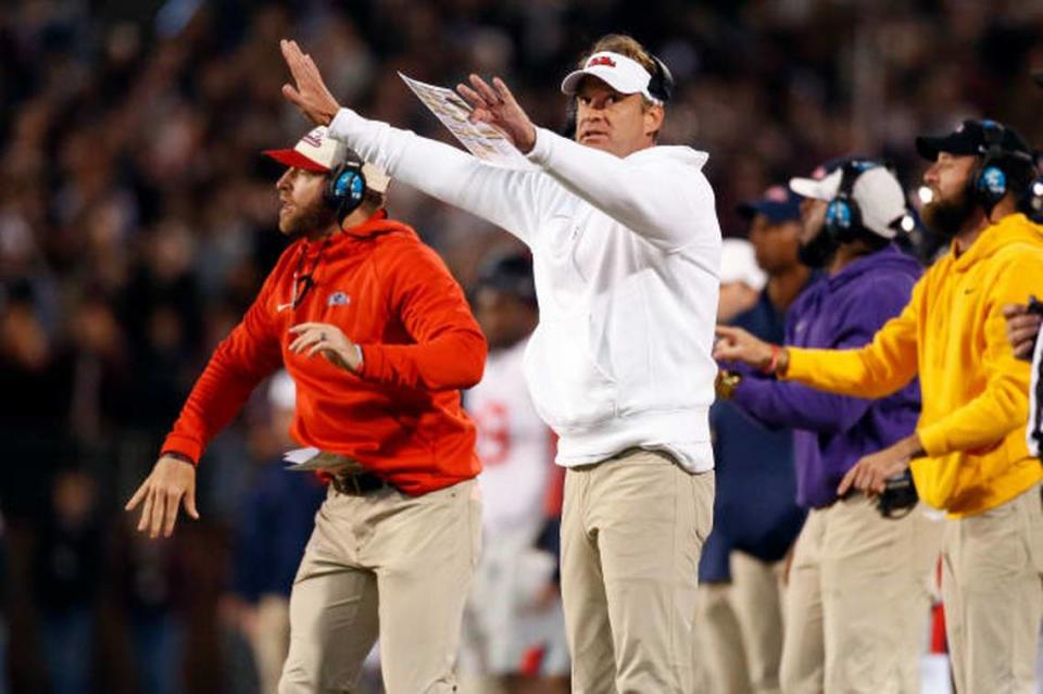 Mississippi Rebels head coach Lane Kiffin signals during the first half of a Nov. 23 game against the Mississippi State Bulldogs at Davis Wade Stadium at Scott Field.