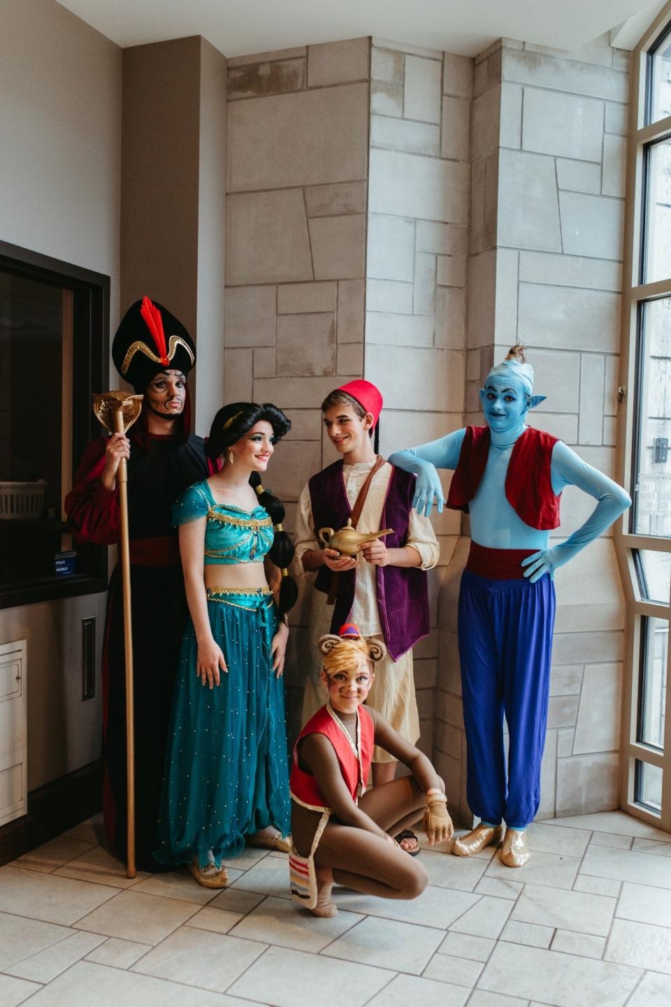 (Left to right) Aaron Saari, Madison Kearney, Robert Harter, Andy Saari, Emma Manchigiah pose the nearly two weeks before opening night.