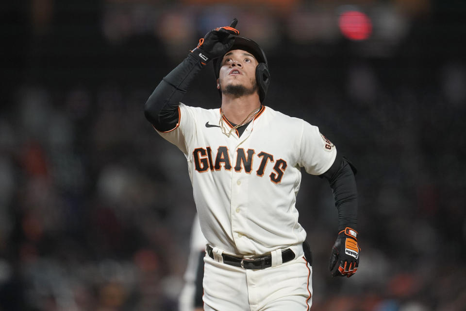 San Francisco Giants' Thairo Estrada gestures after hitting a home run against the San Diego Padres during the third inning of a baseball game in San Francisco, Wednesday, Sept. 15, 2021. (AP Photo/Jeff Chiu)