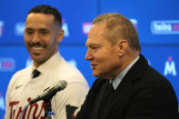Agent Scott Boras, right, speaks to the media next to Minnesota Twins baseball player Carlos Correa during a press conference at Target Field Wednesday, Jan. 11, 2023, in Minneapolis. The team and Correa agreed to a six-year, $200 million contract. (AP Photo/Abbie Parr)