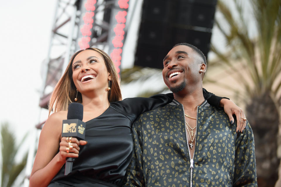 Actors Kat Graham(L) and Demetrius Shipp onstage at the 2017 MTV Movie And TV Awards at The Shrine Auditorium on May 7, 2017 in Los Angeles, California.&nbsp;