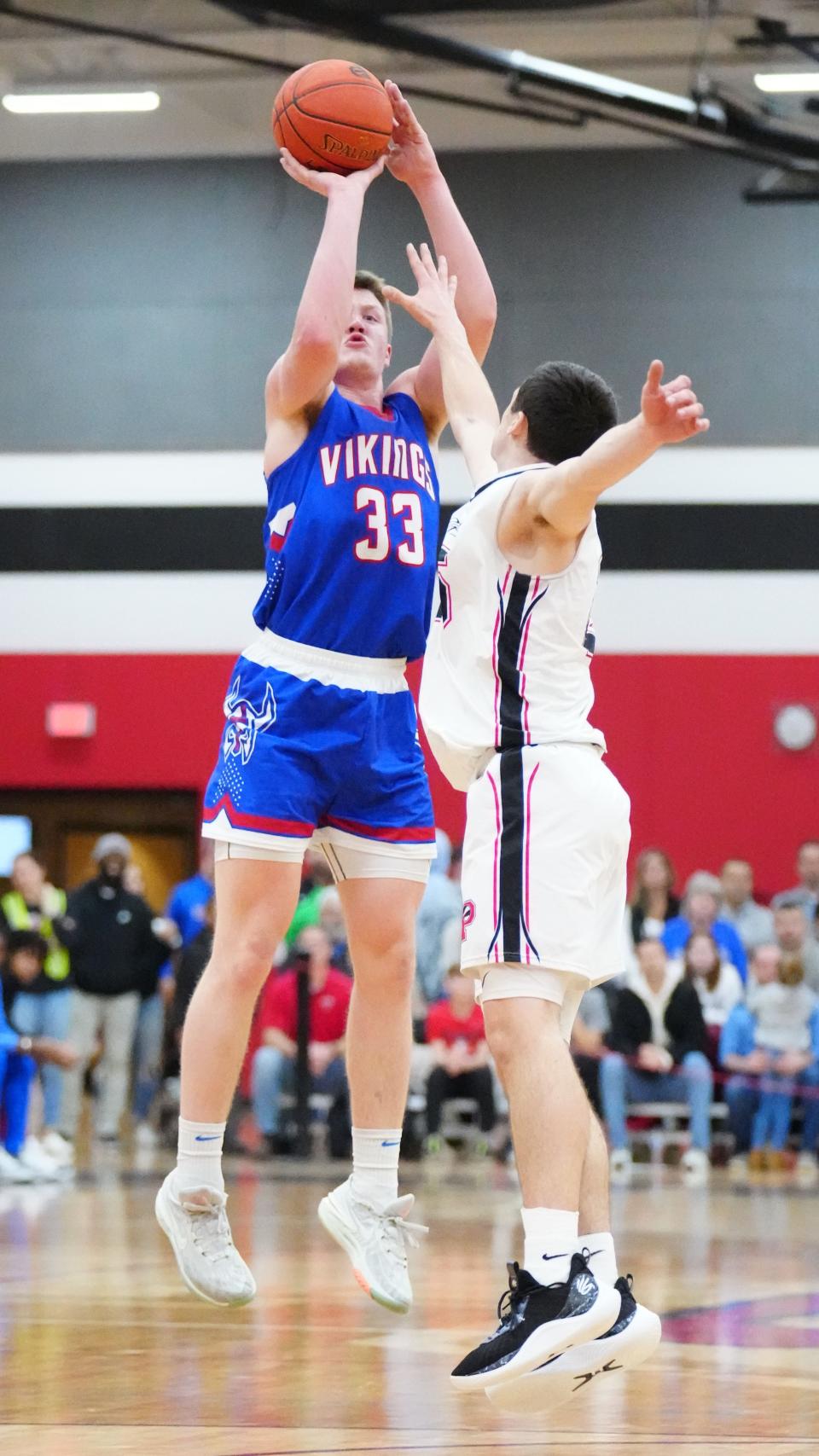 Wisconsin Lutheran's Kon Knueppel (33) and Pewaukee's Nick Janowski are both strong candidates to win the Wisconsin Basketball Coaches Association Mr. Basketball award.