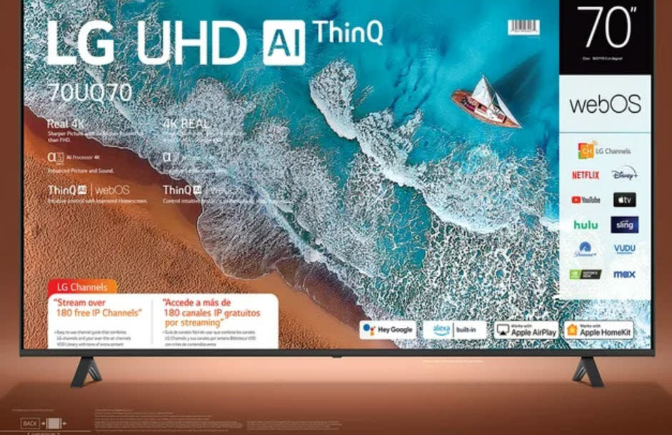 LG UHD TV screen showing a surfing scene with app icons like Netflix, YouTube, and sports channels