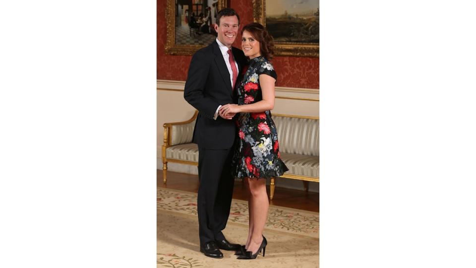 Princess Eugenie of York poses with her fiance Jack Brooksbank in the Picture Gallery at Buckingham Palace in London on January 22, 2018, after the announcement of their engagement. 