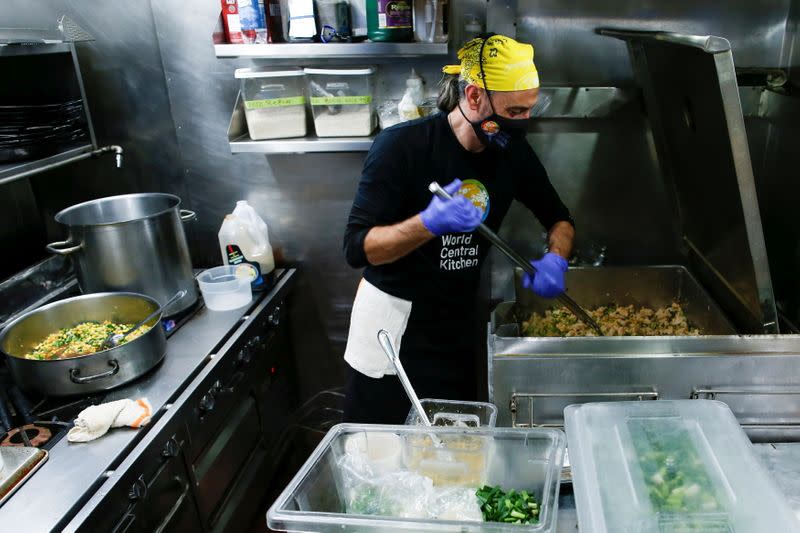 A volunteer of World Central Kitchen prepares food for security personnel deployed ahead of U.S. President-elect Joe Biden's inauguration, in Washington