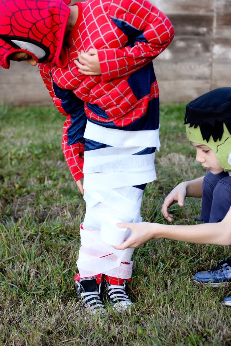 <p>A sack race with a twist! Wrap up everyone's legs with white crepe paper. The first one to the finish line with no rips in the paper wins. </p><p><strong>Get the tutorial at <a href="https://www.deliacreates.com/five-easy-halloween-games-kids/" rel="nofollow noopener" target="_blank" data-ylk="slk:Delia Creates;elm:context_link;itc:0;sec:content-canvas" class="link ">Delia Creates</a>.</strong></p><p><strong><a class="link " href="https://www.amazon.com/Creative-Converting-Touch-Streamer-500-Feet/dp/B00H2CVKJ4/ref=sr_1_2?dchild=1&keywords=white+crepe+paper&qid=1626721626&sr=8-2&tag=syn-yahoo-20&ascsubtag=%5Bartid%7C10050.g.3476%5Bsrc%7Cyahoo-us" rel="nofollow noopener" target="_blank" data-ylk="slk:SHOP CREPE PAPER;elm:context_link;itc:0;sec:content-canvas">SHOP CREPE PAPER</a><br></strong></p>