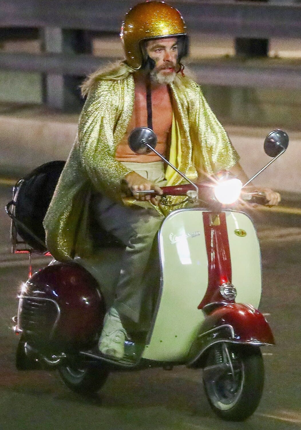 Chris Pine has an issue with his Vespa while filming shirtless for his next project 'Poolman' in Downtown Los Angeles.