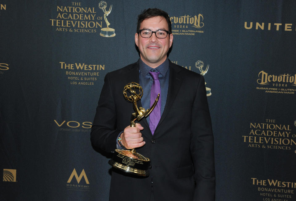 Tyler Christopher poses in the pressroom with the award for outstanding lead actor for 