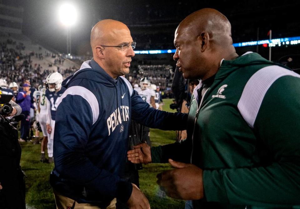 Penn State football coach James Franklin and Michigan State coach Mel Tucker shake hands after the game on Saturday, Nov. 26, 2022.