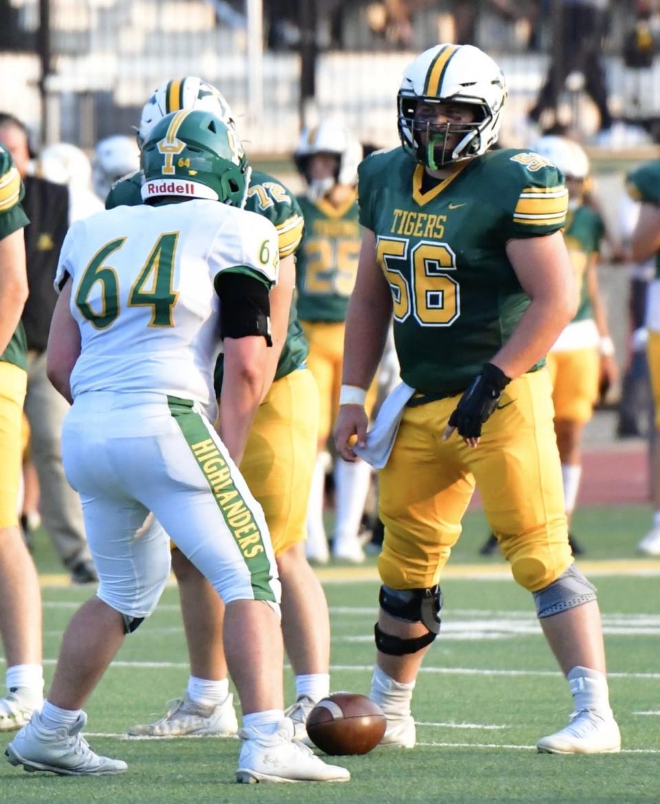 St. Xavier High School senior Carter Guillaume (56) is a center on the football team and a state champion wrestler.