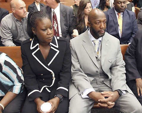 The parents of Trayvon Martin, Sybrina Fulton, left, and Tracy Martin, sit in the courtroom April 20, 2012, during a bond hearing for George Zimmerman in Sanford, Fla. Circuit Judge Kenneth Lester said Zimmerman could be released on $150,000 bail as he awaited trial for the shooting death of Trayvon Martin. Zimmerman was later acquitted of second-degree murder in the shooting of Martin.