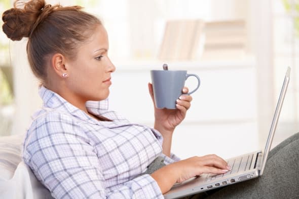 young female working at home in ...