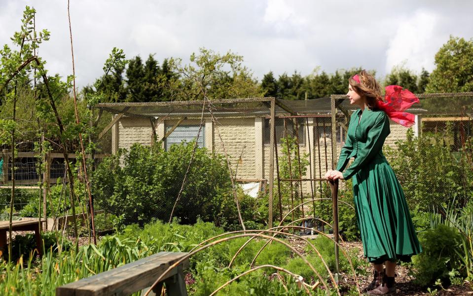 Rebecca working on her vegetable plot - Clara Molden for The Telegraph