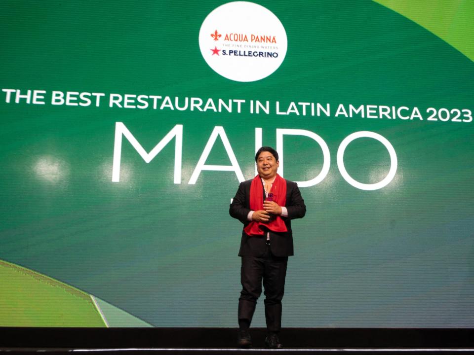 Mitsuharu Tsumura, also known as Micha, poses for a picture with the award after his restaurant, Maido, was named as the winner of "The Best Restaurant in Latin America 2023."