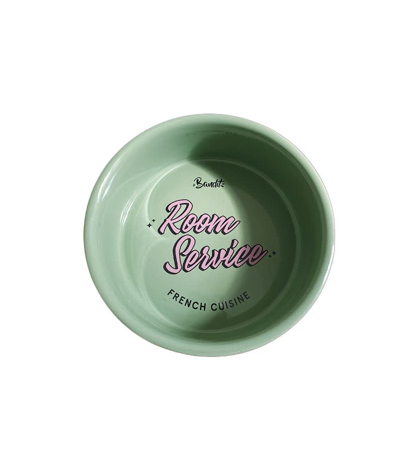 green dog bowl with pink writing