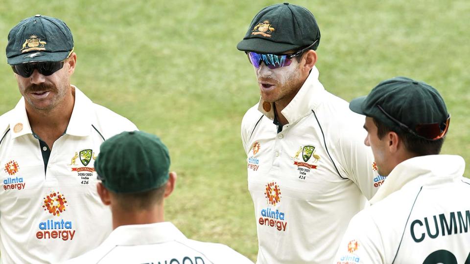 Tim Paine, pictured here speaking to his players during the fourth Test against India.