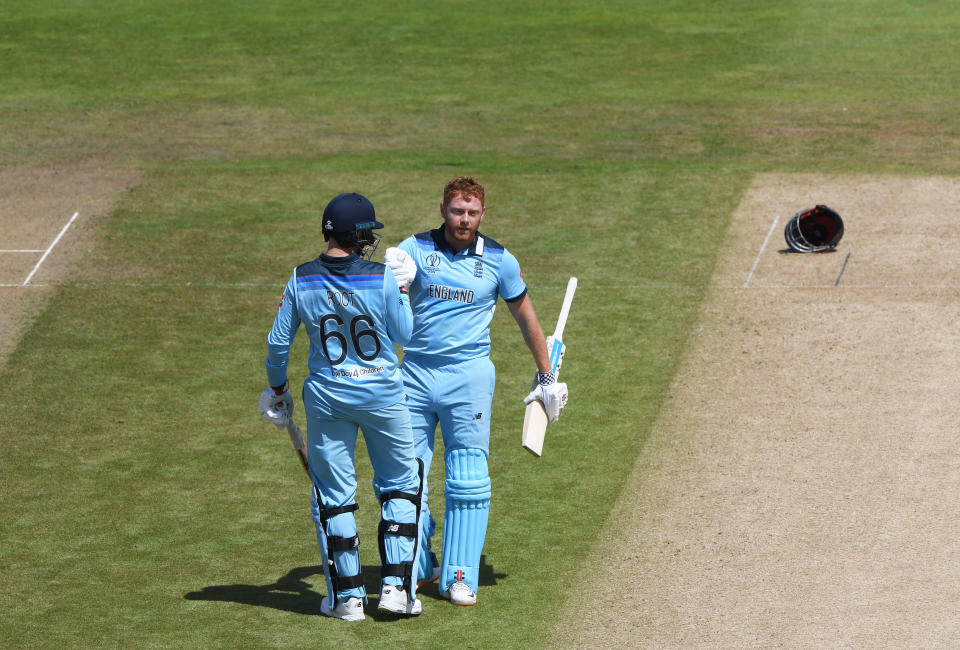 BIRMINGHAM, ENGLAND - JUNE 30: Jonny Bairstow of England celebrates his century with Joe Root of England during the Group Stage match of the ICC Cricket World Cup 2019 between England and India at Edgbaston on June 30, 2019 in Birmingham, England. (Photo by Stu Forster-IDI/IDI via Getty Images)