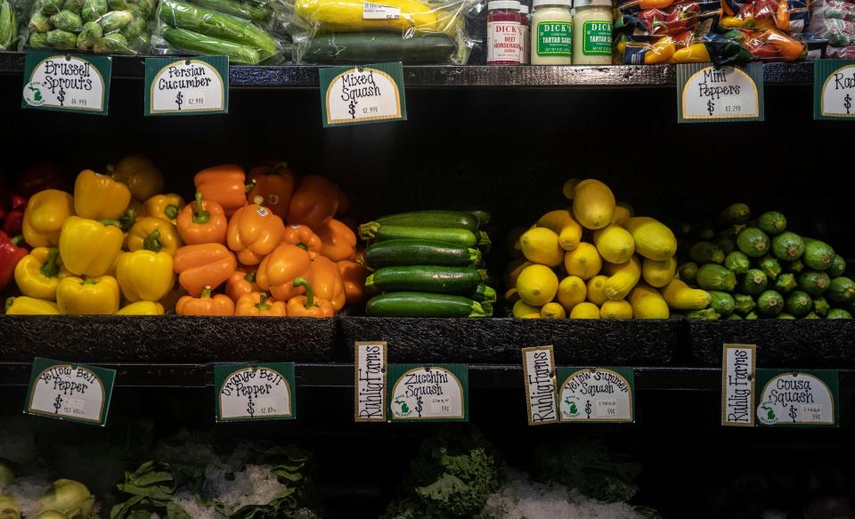 Zucchini and other produce sit in a display cooler inside the Farm Fresh Market at Ruhlig Farms & Gardens in Brownstown on Thursday, Aug. 3, 2023.