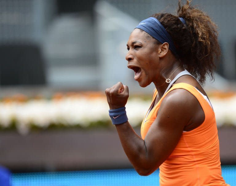 US player Serena Williams celebrates after beating Spain's Lourdes Dominguez Lino at the Madrid Masters on May 7, 2013. Williams won the match 6-2, 7-5