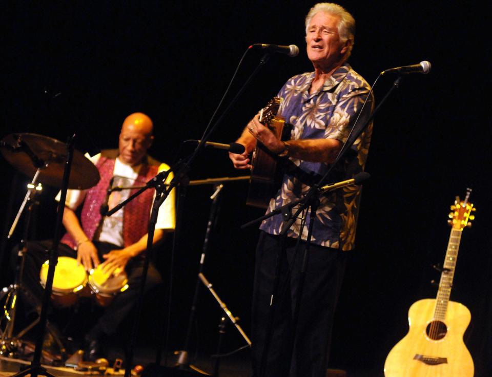 Madafo Lloyd Wilson, left, and John Golden perform during the Summer Hootenanny with John Golden and Friends at Kenan Auditorium on the campus of UNCW in 2013. Wilson died Sept. 17 and Golden died in 2021.