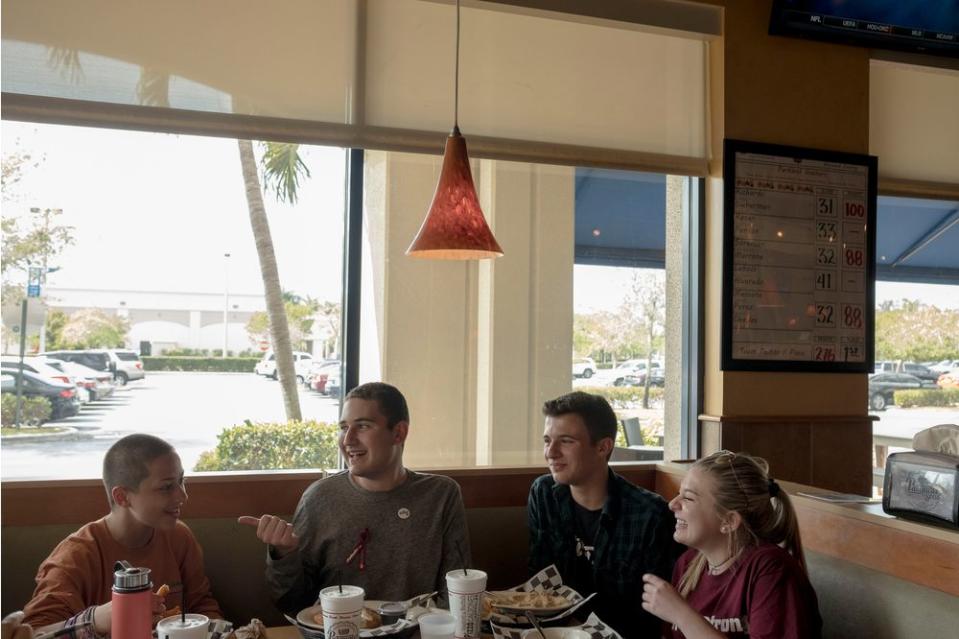 Emma González, Alex Wind, Cameron Kasky and Jaclyn Corin dine at Pasquales in Coral Springs near Parkland on March 6.