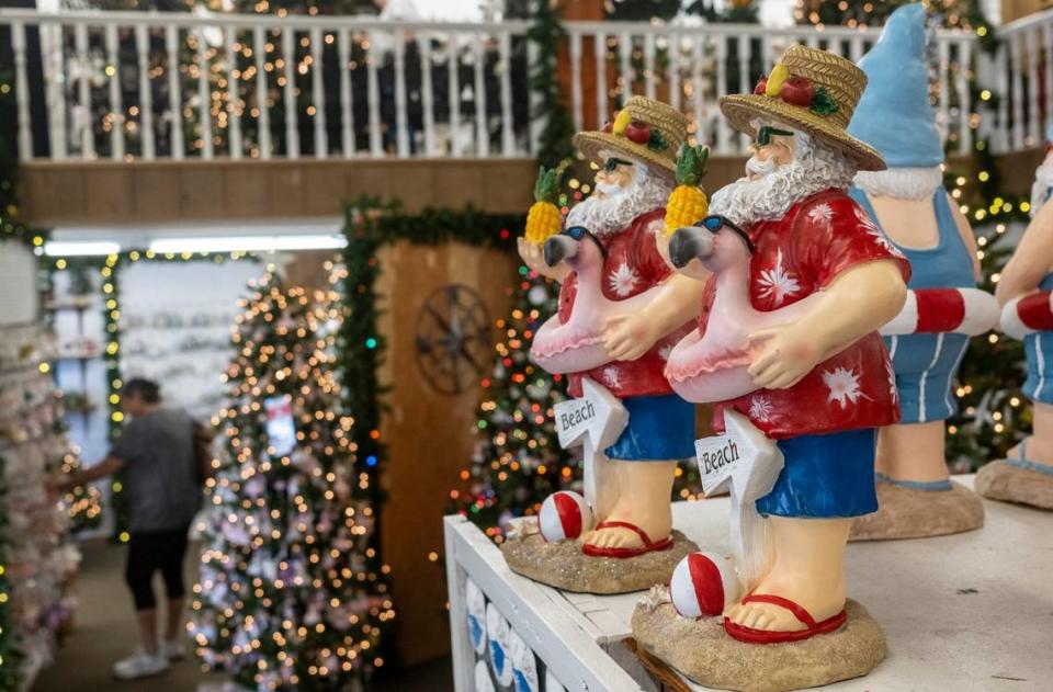 Unique holiday ornaments and decorations fill the Christmas trees and the wall displays of The Christmas Mouse in Myrtle Beach, S.C. November 17, 2022.