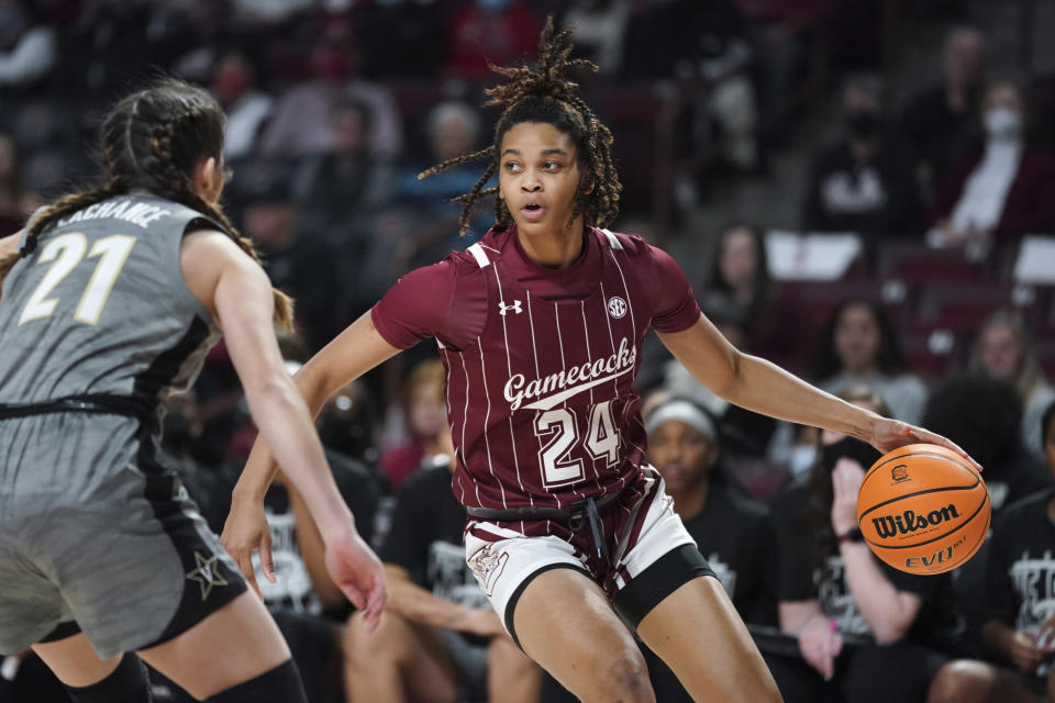 South Carolina guard LeLe Grissett (24) dribbles against Vanderbilt guard Bella LaChance (21) during the first half of an NCAA college basketball game Monday, Jan. 24, 2022, in Columbia, S.C. (AP Photo/Sean Rayford)