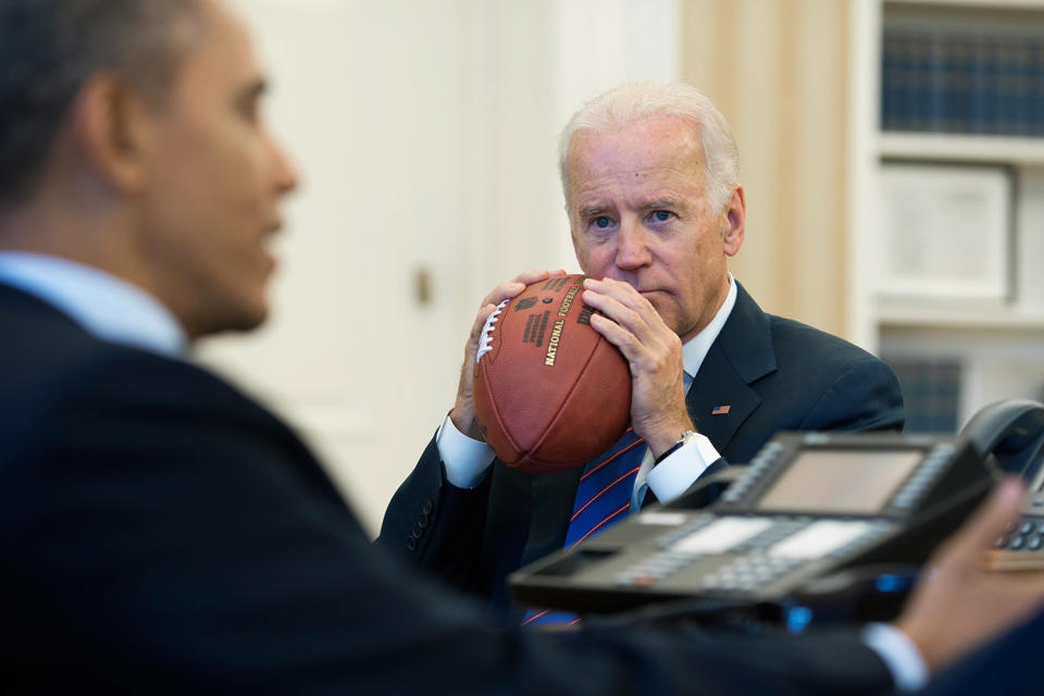 President Barack Obama, with Vice President Joe Biden, conducts a conference call with Rob Nabors, Deputy Chief of Staff for Policy, and Senate Majority Leader Harry Reid to discuss the federal government shutdown and debt ceiling, in the Oval Office, Oct. 15, 2013. (Official White House Photo by Pete Souza)   This official White House photograph is being made available only for publication by news organizations and/or for personal use printing by the subject(s) of the photograph. The photograph may not be manipulated in any way and may not be used in commercial or political materials, advertisements, emails, products, promotions that in any way suggests approval or endorsement of the President, the First Family, or the White House.