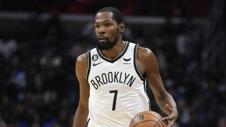 Brooklyn Nets forward Kevin Durant dribbles during the second half of an NBA basketball game against the Los Angeles Clippers Saturday, Nov. 12, 2022, in Los Angeles. (AP Photo/Marcio Jose Sanchez)