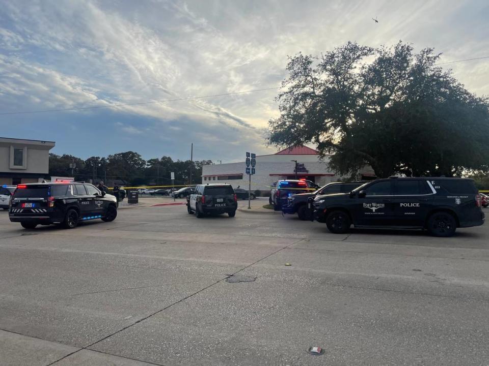 Fort Worth police respond to a 911 call reporting that an officer was shot Monday afternoon, Nov. 27, 2023 at the Fort Worth Community Credit Union on Brentwood Stair Road.