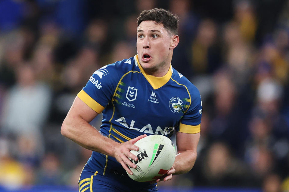 Mitchell Moses runs the ball.