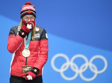 FILE PHOTO - Feb 20, 2018; Pyeongchang, South Korea; Cassie Sharpe (CAN) celebrates winning the gold medal in the freestyle skiing halfpipe event during the medals ceremony in the Pyeongchang 2018 Olympic Winter Games at Medals Plaza. Mandatory Credit: Kelvin Kuo-USA TODAY Sports