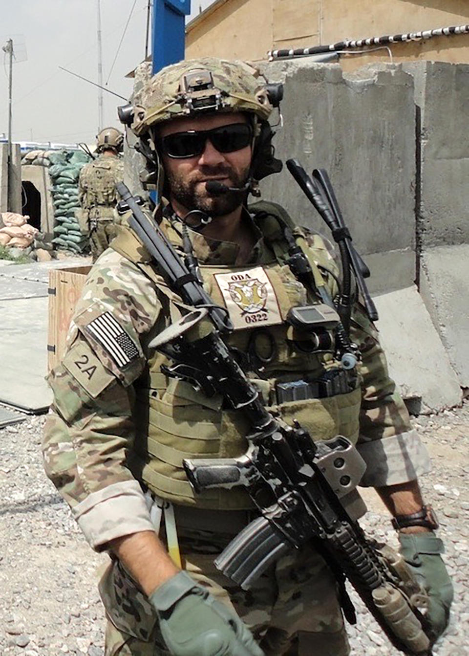 In this undated photo provided by Ryan Brummond, U.S. Special Forces Officer Ryan Brummond is seen in Afghanistan. Mohammad Khalid Wardak or Khalid, as he's called by his friends, had no intention of leaving Afghanistan, where he was a high-profile national police officer who'd worked alongside Brummond and American special forces to defeat the Taliban. Then with stunning speed, his government collapsed. Now he is in hiding with his wife and four children, wounded and hunted by the Taliban, desperately hoping that American officials will repay his loyalty by helping his family escape almost certain death. (Ryan Brummond via AP)