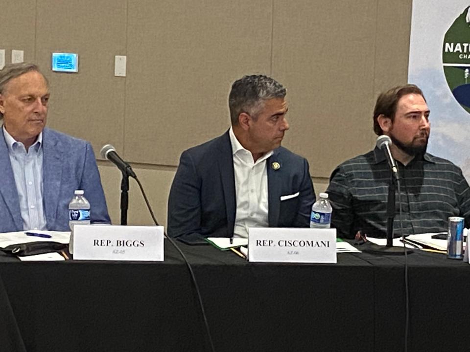 Arizona Republican Reps. Andy Biggs, Juan Ciscomani and Eli Crane attend a congressional field hearing in Goodyear on July 21, 2023.