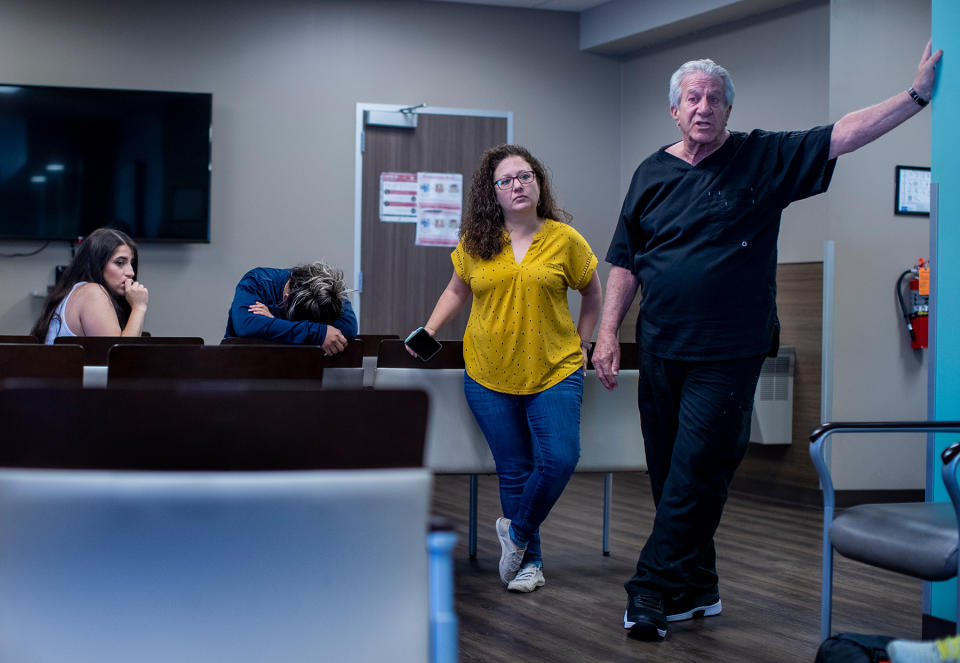 SAN ANTONIO, TX- JUNE 24, 2022: Dr Alan Braid, right, informs patients inside the waiting room that he can no longer provide abortion services since the Supreme Court had just overturned Roe v. Wade  shutting down abortion services at Alamo Womens Reproductive Services on June 24, 2022 in San Antonio, Texas. The clinic had to turn patients away once the ruling came down.(Gina Ferazzi / Los Angeles Times via Getty Images)