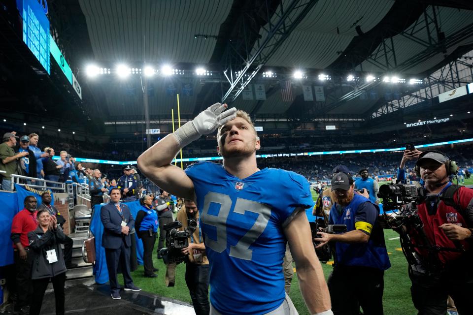 Detroit Lions defensive end Aidan Hutchinson walks off the field after a 41-10 win against the Chicago Bears on Jan. 1, 2023, in Detroit.