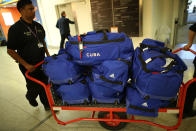 Baggage belonging to the Cuban Olympic weightlifting team is transported through Heathrow Airport on July 16, 2012 in London, England. Athletes, coaches and Olympic officials are beginning to arrive in London ahead of the Olympics. (Photo by Peter Macdiarmid/Getty Images)