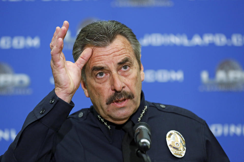 Los Angeles Police Chief Charlie Beck speaks at news conference at LAPD headquarters in downtown Los Angeles Tuesday, Feb. 4, 2014. A civilian oversight board has determined that eight Los Angeles police officers violated department policy when they mistakenly opened fire on two women during the manhunt for rogue ex-cop Christopher Dorner. The Police Commission's decision announced Tuesday leaves the question of disciplinary measures to Beck. The officers have been assigned to non-field duties pending the internal investigation. (AP Photo/Reed Saxon)